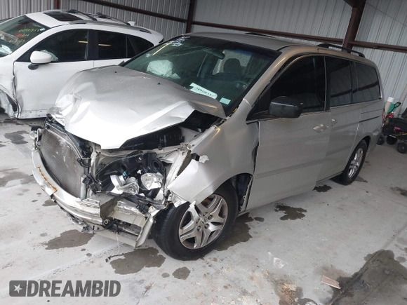 2007 Honda Odyssey EX with VIN 5FNRL384X7B451892, listed as a IAAI auction lot 42020537 with 162,257 mi miles and . Bid and sale history available at DreamBid. Image 17.