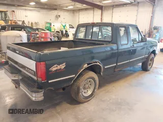 1994 Ford F-150 with VIN 1FTEX14H1RKA60071, listed as a IAAI auction lot 41887754 with 160,447 mi miles. Bid and sale history available at carsss.com. Image 4.