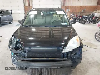 2007 Honda CR-V EX z VIN JHLRE48567C062496, wystawiony jako IAAI lot #42198115 z przebiegiem 225 559 mil mil oraz . Historia ofert i sprzedaży dostępna na DreamBid. Obrazek 12.