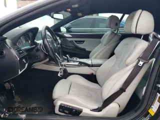 2016 BMW M6 z VIN WBS6G9C58GD931908, wystawiony jako Copart lot #72067214 z przebiegiem 84 170 mil mil oraz Szkody całkowita. Historia ofert i sprzedaży dostępna na DreamBid. Obrazek 7.