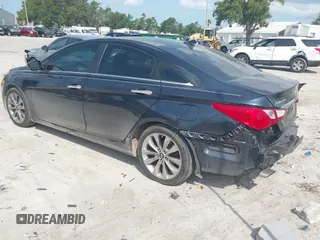 2011 Hyundai Sonata SE z VIN 5NPEC4AB4BH178519, wystawiony jako IAAI lot #42369746 z przebiegiem 107 067 mil mil oraz . Historia ofert i sprzedaży dostępna na DreamBid. Obrazek 3.