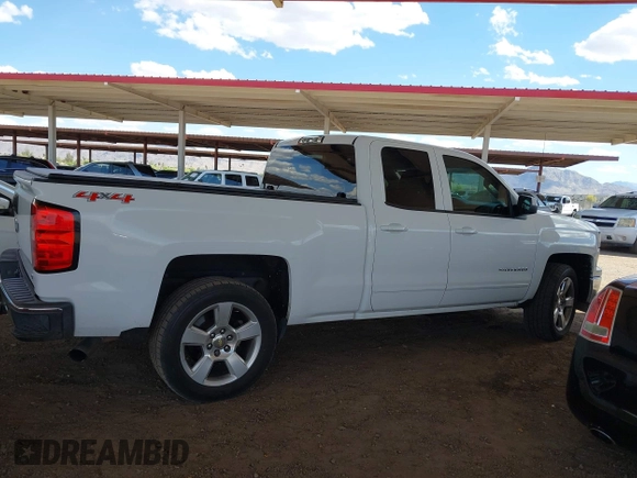 2015 Chevrolet Silverado 1500 LT with VIN 1GCVKREC1FZ415386, listed as a IAAI auction lot 42142990 with 165,409 mi miles and . Bid and sale history available at DreamBid. Image 13.