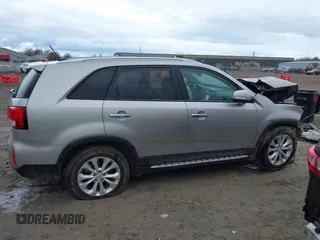 2014 Kia Sorento EX with VIN 5XYKUDA71EG456929, listed as a IAAI auction lot 42012720 with 128,557 mi miles. Bid and sale history available at carsss.com. Image 14.