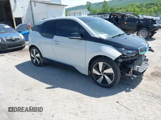 2015 BMW i3 z VIN WBY1Z4C58FV501754, wystawiony jako IAAI lot #42220253 z przebiegiem 59 022 mil mil oraz . Historia ofert i sprzedaży dostępna na DreamBid. Obrazek 1.