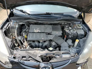 2011 Mazda 2 Sport z VIN JM1DE1HY4B0112807, wystawiony jako Copart lot #59209795 z przebiegiem 192 850 mil mil oraz Czysty tytuł • Clean title. Historia ofert i sprzedaży dostępna na DreamBid. Obrazek 11.