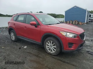 2016 Mazda CX-5 Sport with VIN JM3KE4BY1G0768530, listed as a Copart auction lot 60521795 with 118,132 mi miles and Salvage title. Bid and sale history available at DreamBid. Image 4.