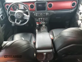 2021 Jeep Gladiator Rubicon with VIN 1C6JJTBG3ML602478, listed as a Copart auction lot 58138705 with 76,759 mi miles and Salvage title. Bid and sale history available at DreamBid. Image 8.