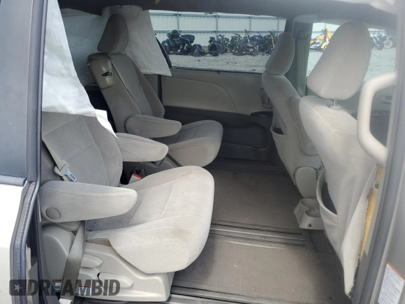 2015 Toyota Sienna LE AAS with VIN 5TDKK3DC8FS582699, listed as a Copart auction lot 56682415 with 195,915 mi miles and Salvage title. Bid and sale history available at DreamBid. Image 11.