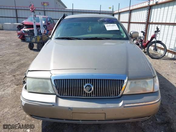 2004 Mercury Grand Marquis GS with VIN 2MEFM74W94X674014, listed as a IAAI auction lot 41973693 with 163,865 mi miles. Bid and sale history available at carsss.com. Image 11.