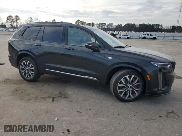 2023 Cadillac XT6 AWD Sport with VIN 1GYKPHRS3PZ150630, listed as a Copart auction lot 43557595 with 54,299 mi miles and Salvage title. Bid and sale history available at DreamBid. Image 4.