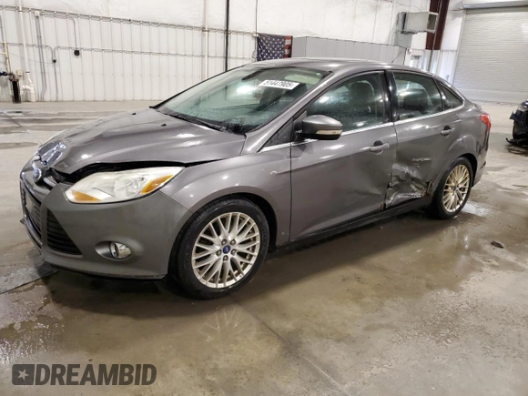 2012 Ford Focus SEL with VIN 1FAHP3H29CL386660, listed as a Copart auction lot 51447905 with 210,075 mi miles and Salvage Title. Bid and sale history available at carsss.com. Image 1.
