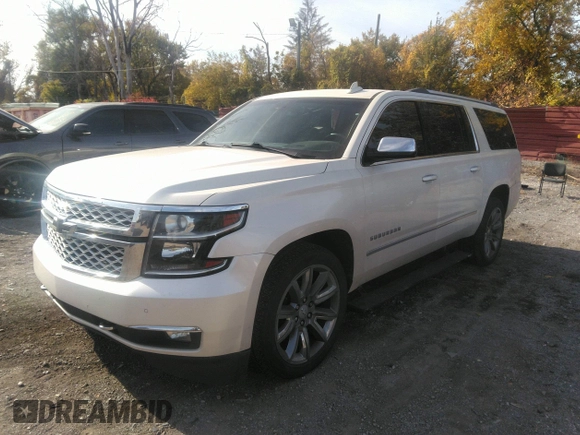 2015 Chevrolet Suburban LTZ with VIN 1GNSKKKC0FR551031, listed as a IAAI auction lot 40694559 with 184,261 mi miles. Bid and sale history available at carsss.com. Image 17.