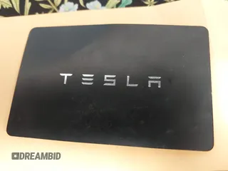 2022 Tesla Model Y Long Range with VIN 7SAYGDEE4NF428434, listed as a IAAI auction lot 41578503 with 35,460 mi miles and . Bid and sale history available at DreamBid. Image 11.