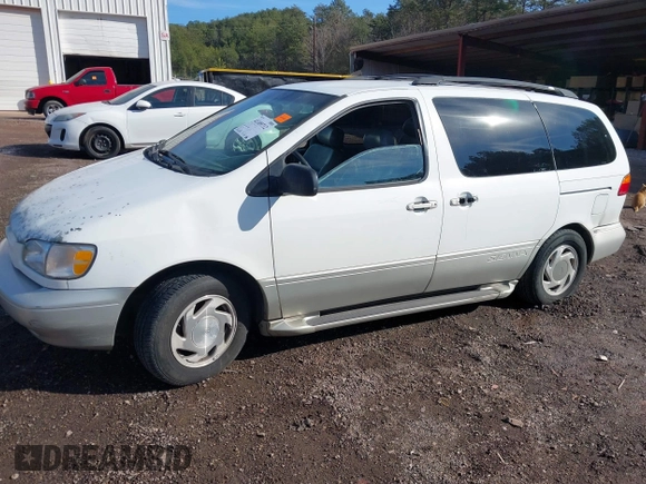 1999 Toyota Sienna LE with VIN 4T3ZF13C5XU161001, listed as a IAAI auction lot 41309712 with 364,688 mi miles. Bid and sale history available at carsss.com. Image 6.