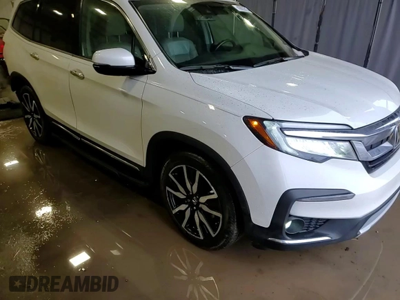 2020 Honda Pilot Touring 8-Passenger with VIN 5FNYF6H98LB058712, listed as a Copart auction lot 43622815 with 81,854 mi miles and Salvage Title. Bid and sale history available at DreamBid. Image 15.