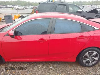 2020 Honda Civic LX with VIN 2HGFC2F60LH537283, listed as a IAAI auction lot 42200465 with 86,191 mi miles and . Bid and sale history available at DreamBid. Image 14.