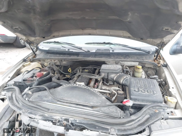 2004 Jeep Grand Cherokee Laredo with VIN 1J4GX48S44C301120, listed as a IAAI auction lot 41281556 with 267,246 mi miles. Bid and sale history available at carsss.com. Image 10.