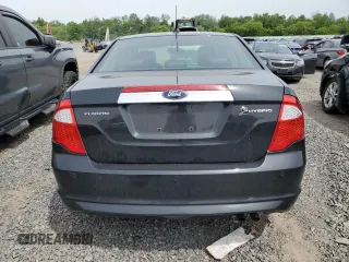 2010 Ford Fusion Hybrid с VIN 3FADP0L34AR129353, выставлен на аукционе Copart как лот 58310725 с пробегом 237 662 миль миль и Списание • Salvage title. История ставок и продаж доступна на DreamBid. Изображение 6.
