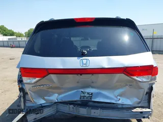 2014 Honda Odyssey Touring with VIN 5FNRL5H91EB068427, listed as a IAAI auction lot 42163315 with 184,134 mi miles and . Bid and sale history available at DreamBid. Image 17.