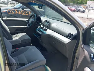 2008 Honda Odyssey LX with VIN 5FNRL38228B090366, listed as a IAAI auction lot 42336820 with 319,401 mi miles and . Bid and sale history available at DreamBid. Image 5.