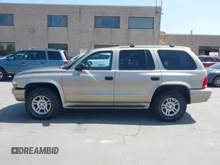 2003 Dodge Durango SLT z VIN 1D4HS48N43F517701, wystawiony jako IAAI lot #42277135 z przebiegiem 135 521 mil mil oraz . Historia ofert i sprzedaży dostępna na DreamBid. Obrazek 14.