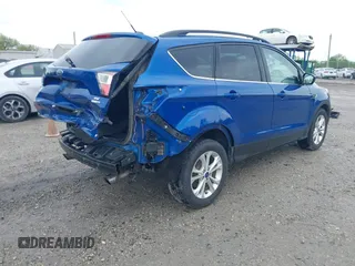 2017 Ford Escape SE с VIN 1FMCU9GD9HUB87656, выставлен на аукционе IAAI как лот 42233585 с пробегом 116 558 миль миль и . История ставок и продаж доступна на DreamBid. Изображение 4.