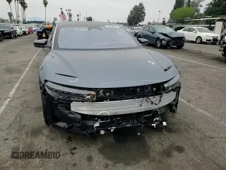 2025 Lucid Air Touring z VIN 50EA1TEA6SA006821, wystawiony jako Copart lot #53298645 z przebiegiem 470 mil mil oraz Szkoda całkowita • Salvage title. Historia ofert i sprzedaży dostępna na DreamBid. Obrazek 11.