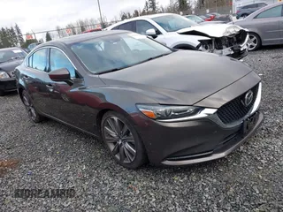 2018 Mazda 6 Grand Touring with VIN JM1GL1TYXJ1301545, listed as a IAAI auction lot 41131114 with 34,089 mi miles and . Bid and sale history available at DreamBid. Image 1.