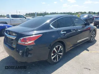 2014 Nissan Altima SV with VIN 1N4AL3AP3EC174276, listed as a IAAI auction lot 42070847 with 128,355 mi miles and . Bid and sale history available at carsss.com. Image 4.