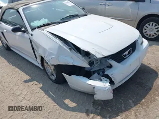 2003 Ford Mustang Deluxe z VIN 1FAFP444X3F378411, wystawiony jako IAAI lot #42682826 z przebiegiem 162 271 mil mil oraz . Historia ofert i sprzedaży dostępna na DreamBid. Obrazek 6.