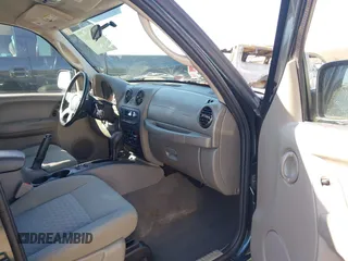 2005 Jeep Liberty Sport with VIN 1J4GL48K05W584675, listed as a IAAI auction lot 41867491 with 112,882 mi miles. Bid and sale history available at carsss.com. Image 5.