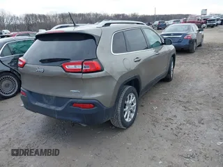 2016 Jeep Cherokee Latitude with VIN 1C4PJLCS4GW347218, listed as a IAAI auction lot 41651285 with 95,169 mi miles. Bid and sale history available at carsss.com. Image 4.