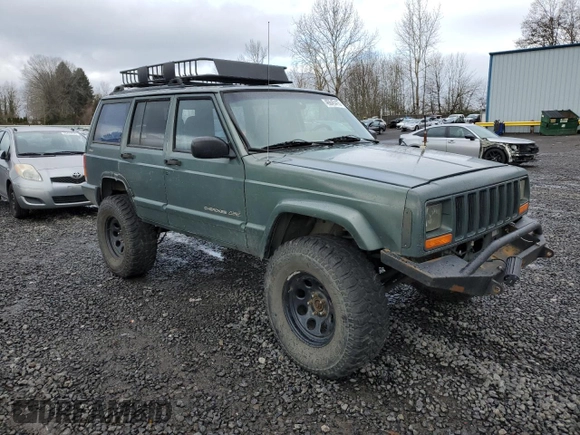 2000 Jeep Cherokee Classic with VIN 1J4FF58S3YL104384, listed as a Copart auction lot 46645415 with 253,730 mi miles and Salvage Title. Bid and sale history available at carsss.com. Image 4.