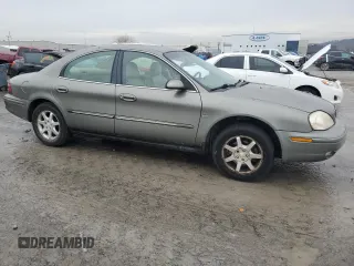 2001 Mercury Sable LS with VIN 1MEHM55SX1G608761, listed as a Copart auction lot 43158475 with 184,120 mi miles and Salvage Title. Bid and sale history available at DreamBid. Image 4.