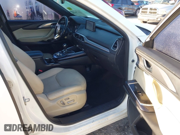 2019 Mazda CX-9 Grand Touring with VIN JM3TCADY3K0305173, listed as a IAAI auction lot 41672448 with 132,265 mi miles. Bid and sale history available at carsss.com. Image 5.