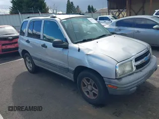2003 Chevrolet Tracker z VIN 2CNBJ13C336946019, wystawiony jako IAAI lot #41814810 z przebiegiem 112 317 mil mil oraz . Historia ofert i sprzedaży dostępna na DreamBid. Obrazek 1.