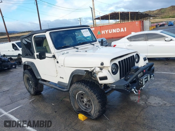 2001 Jeep Wrangler Sport with VIN 1J4FA49S41P308407, listed as a IAAI auction lot 41772240 with 139,461 mi miles. Bid and sale history available at carsss.com. Image 1.