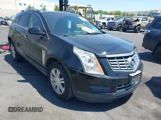2015 Cadillac SRX Luxury Collection z VIN 3GYFNBE32FS579904, wystawiony jako IAAI lot #42321862 z przebiegiem 128 225 mil mil oraz . Historia ofert i sprzedaży dostępna na DreamBid. Obrazek 1.