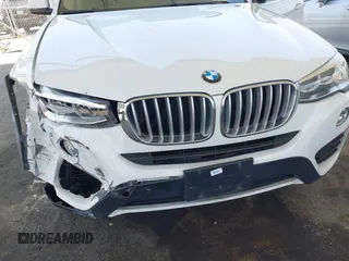 2015 BMW X4 xDrive28i with VIN 5UXXW3C5XF0M89259, listed as a IAAI auction lot 42553903 with 98,960 mi miles and . Bid and sale history available at DreamBid. Image 6.