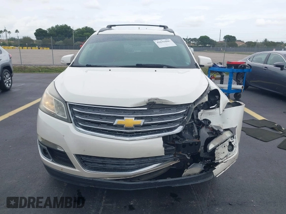2015 Chevrolet Traverse LT z VIN 1GNKRGKD4FJ137234, wystawiony jako IAAI lot #42655806 z przebiegiem 60 871 mil mil oraz . Historia ofert i sprzedaży dostępna na DreamBid. Obrazek 12.