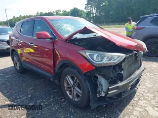 2018 Hyundai Santa Fe 2.4L z VIN 5XYZTDLBXJG542429, wystawiony jako IAAI lot #42261145 z przebiegiem 103 753 mil mil oraz . Historia ofert i sprzedaży dostępna na DreamBid. Obrazek 1.