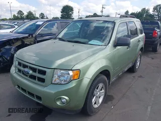 2009 Ford Escape Hybrid with VIN 1FMCU49349KA35580, listed as a IAAI auction lot 42720544 with 95,630 mi miles and . Bid and sale history available at DreamBid. Image 2.