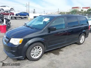 2014 Dodge Grand Caravan SXT 30th Anniversary with VIN 2C4RDGCG7ER122042, listed as a IAAI auction lot 41600892 with 101,596 mi miles. Bid and sale history available at carsss.com. Image 2.
