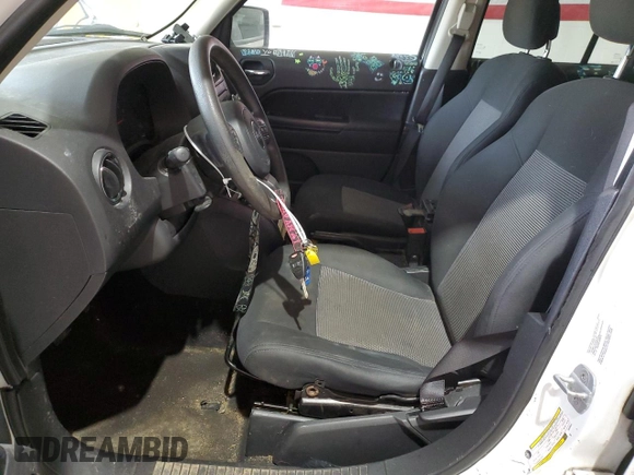 2011 Jeep Patriot Sport with VIN 1J4NT1GA4BD263521, listed as a Copart auction lot 54666735 with 176,606 mi miles and Salvage title. Bid and sale history available at DreamBid. Image 7.