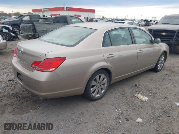 2005 Toyota Avalon XL with VIN 4T1BK36B55U020947, listed as a IAAI auction lot 41081514 with 134,045 mi miles and . Bid and sale history available at DreamBid. Image 4.