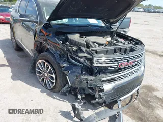 2021 GMC Acadia Denali с VIN 1GKKNPLS0MZ220597, выставлен на аукционе IAAI как лот 41907954 с пробегом 29 494 миль миль и . История ставок и продаж доступна на DreamBid. Изображение 6.
