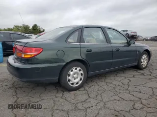 2001 Saturn LS z VIN 1G8JU54F41Y581083, wystawiony jako Copart lot #73123714 z przebiegiem 98 500 mil mil oraz Szkody całkowita. Historia ofert i sprzedaży dostępna na DreamBid. Obrazek 3.