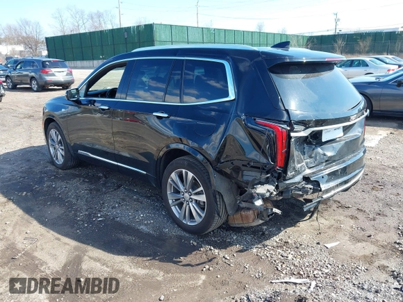 2023 Cadillac XT6 AWD Premium Luxury with VIN 1GYKPDRS8PZ153838, listed as a IAAI auction lot 41838527 with 60,034 mi miles and . Bid and sale history available at DreamBid. Image 3.
