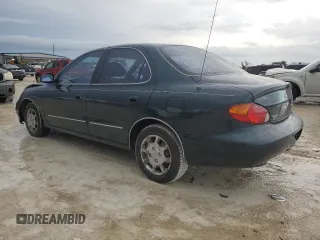 2000 Hyundai Elantra GLS z VIN KMHJF35F3YU002102, wystawiony jako Copart lot #73243004 z przebiegiem 79 155 mil mil oraz Szkoda całkowita • Salvage title. Historia ofert i sprzedaży dostępna na DreamBid. Obrazek 2.