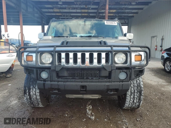 2003 Hummer H2 with VIN 5GRGN23U13H147071, listed as a Copart auction lot 82255674 with 272,215 mi miles and Salvage Title. Bid and sale history available at carsss.com. Image 5.